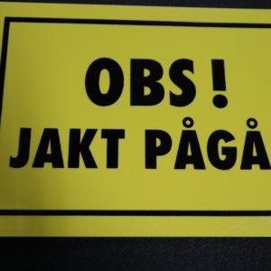 Skylt, OBS! jakt pågår